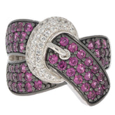 Elegant ring featuring purple and clear gemstones on a sterling silver band, perfect for adding luxury to any outfit.